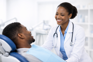 Dentist smiling at patient